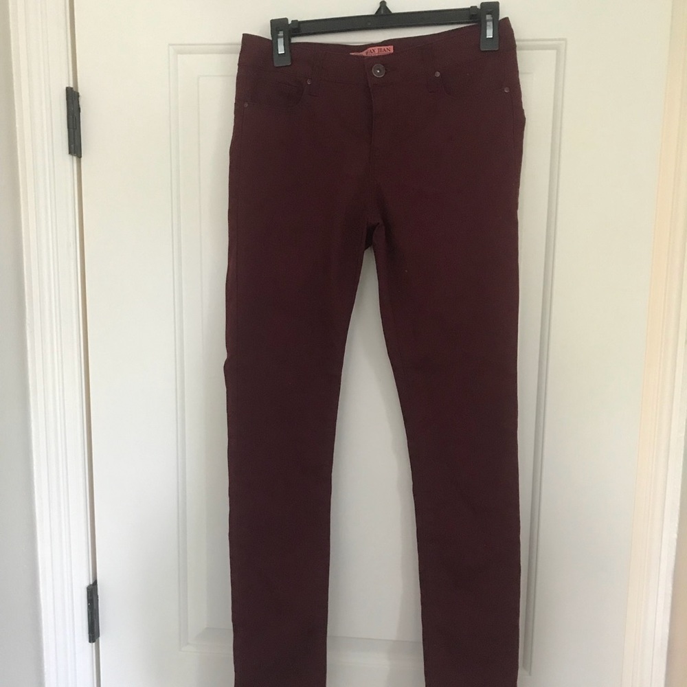 Tight maroon skinny jeans